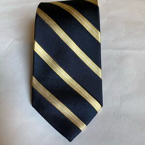 Tommy Hilfiger -Classic navy with diagonal gold stripes 100% silk tie.